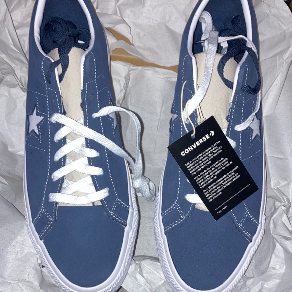 Brand new converse size 12 in men’s, 13.5 women’s.